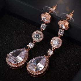 Aretes resplandor oro rosa