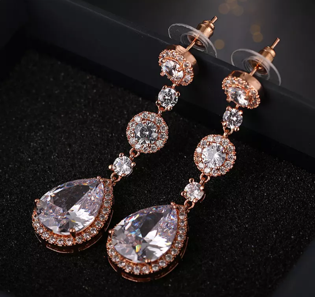 Aretes resplandor oro rosa